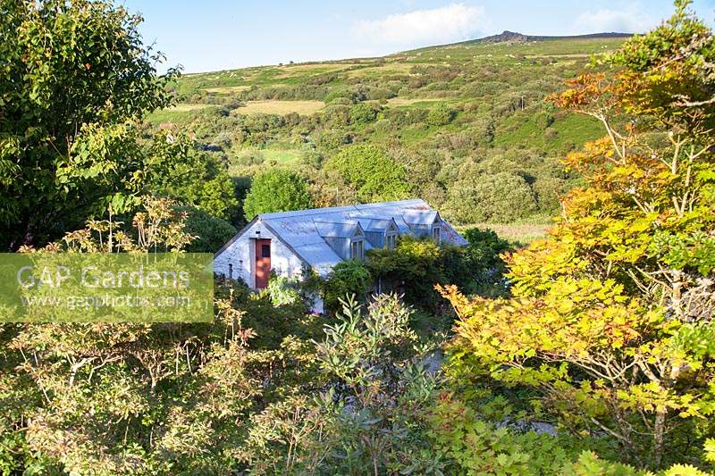 View of Welsh cottage amongst dramatic country views