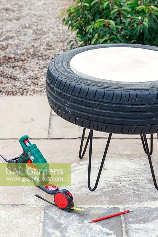 Car tyre with plywood top attached