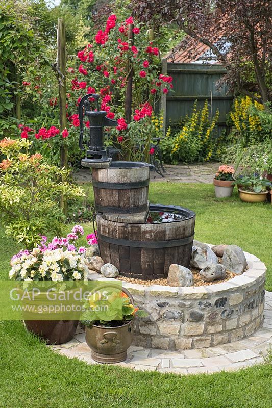 'Wishing Well' feature in cottage garden