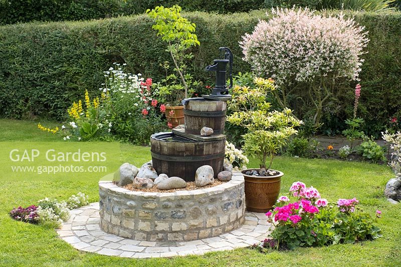 'Wishing Well' feature in cottage garden