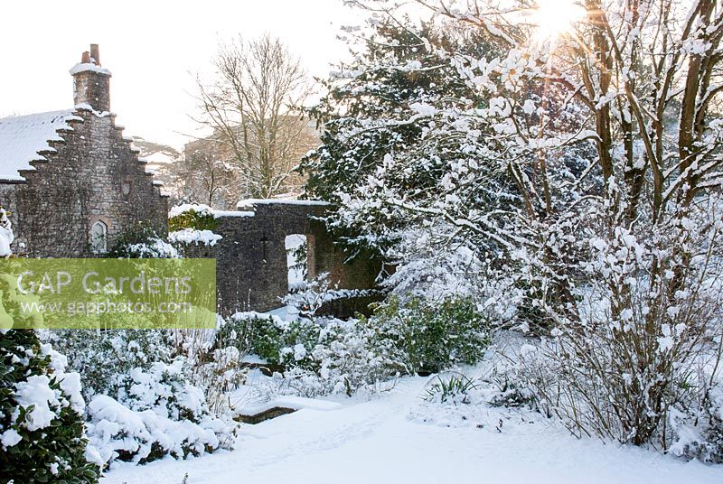 The Gardener's Cottage and garden in snow - Ston Easton Park, Somerset
