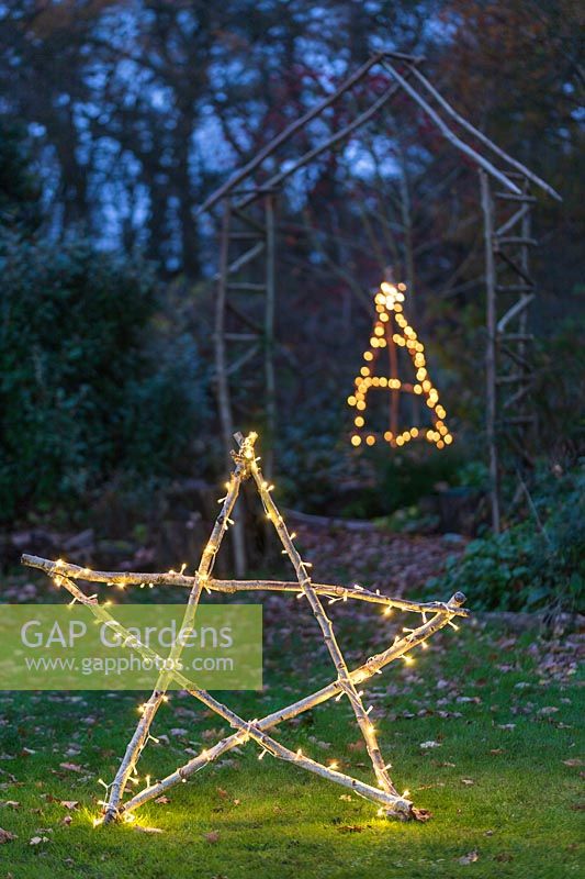 Illuminated natural star with fairylights made with lengths of Hazel sticks