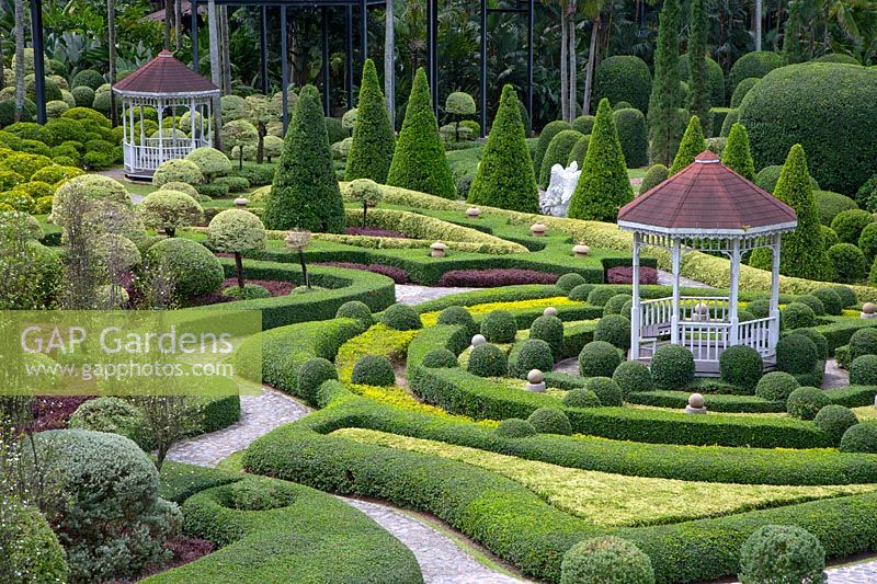 Pavillions in Topiary garden at Nong Nooch Tropical Botanical Garden, Thailand.
