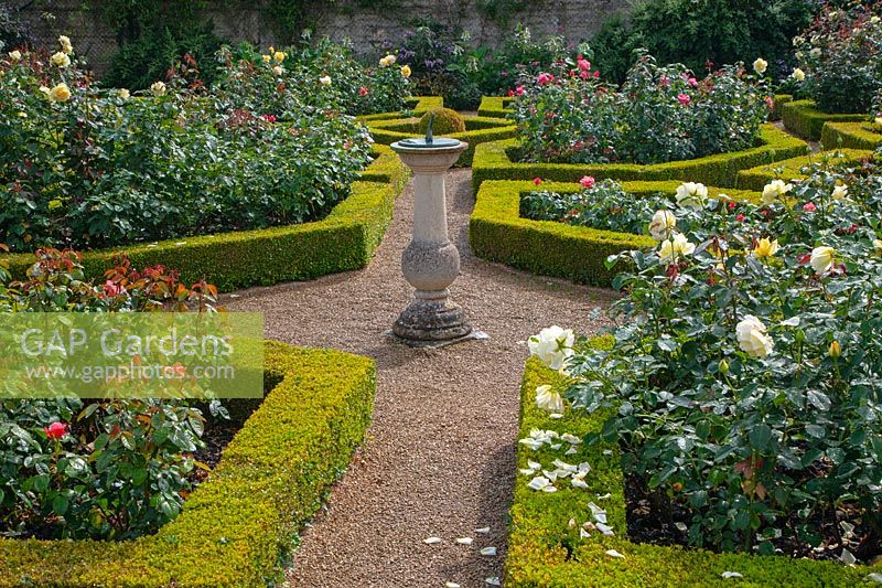 Formal garden with sundial and Buxus parterre - Waterperry Garden, Oxfordshire 
