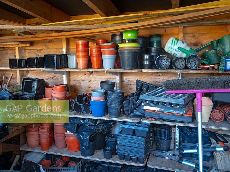 Plastic plant pots in a potting shed 