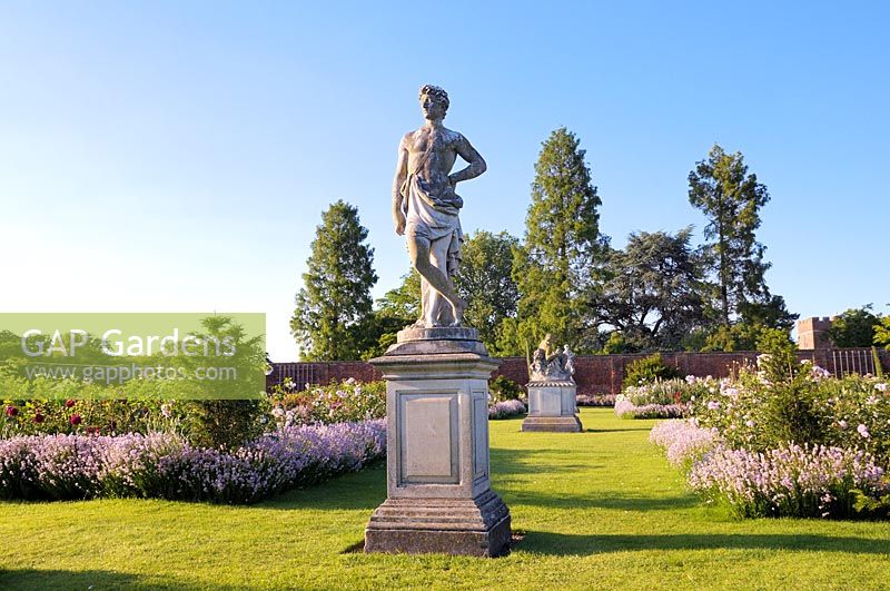 Statue of Adonis in the Rose Garden at Hampton Court Palace - East Molesey, Surrey, UK