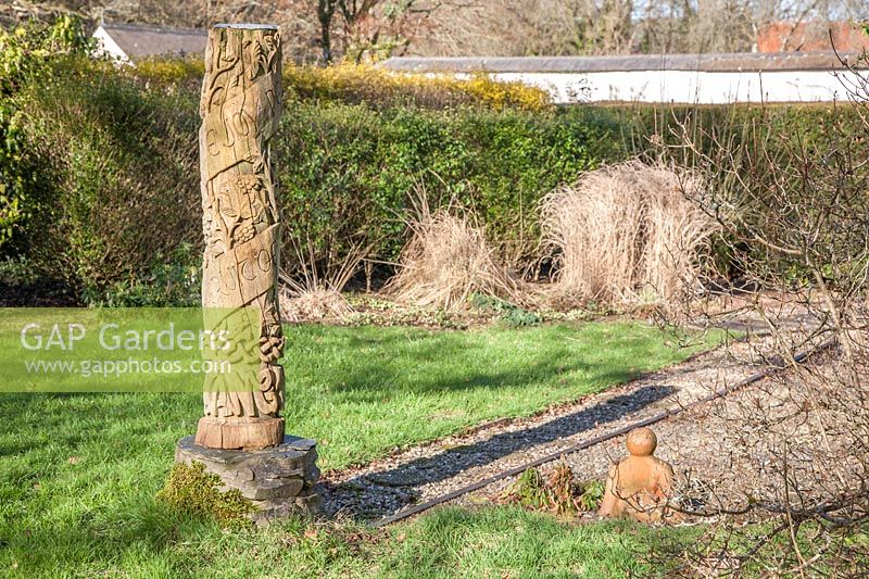 The shadow of the Meridian column at midday in mid-February in the Meridian Garden, Llanllyr. 