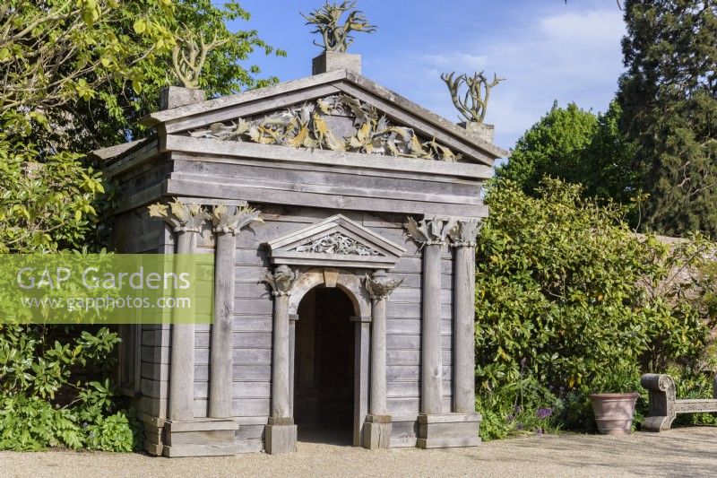 Temple made from green oak and topped with antlers from the estate, designed by Julian and Isabel Bannerman in the Collector Earl's Garden at Arundel Castle, West Sussex in May