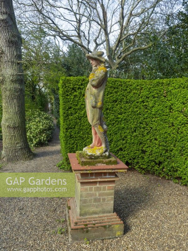 Statue in woodland - East Ruston Old Vicarage Gardens, Norfolk