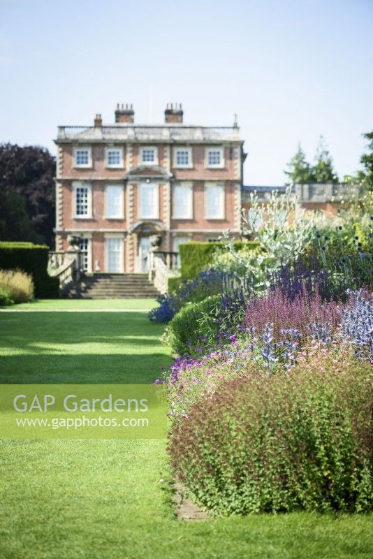 Herbaceous borders leading towards Newby Hall in July