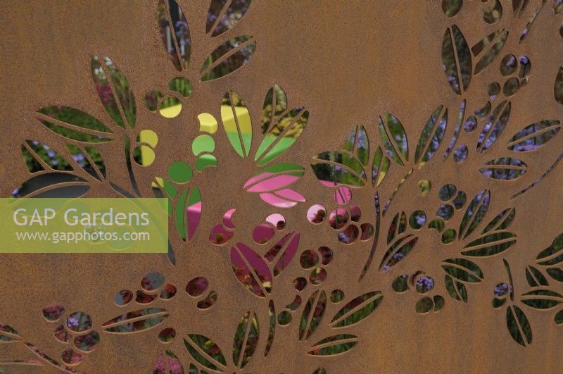 Detail of filigree corten steel panel - Colour Box garden, RHS Hampton Court Palace Flower Show 2017