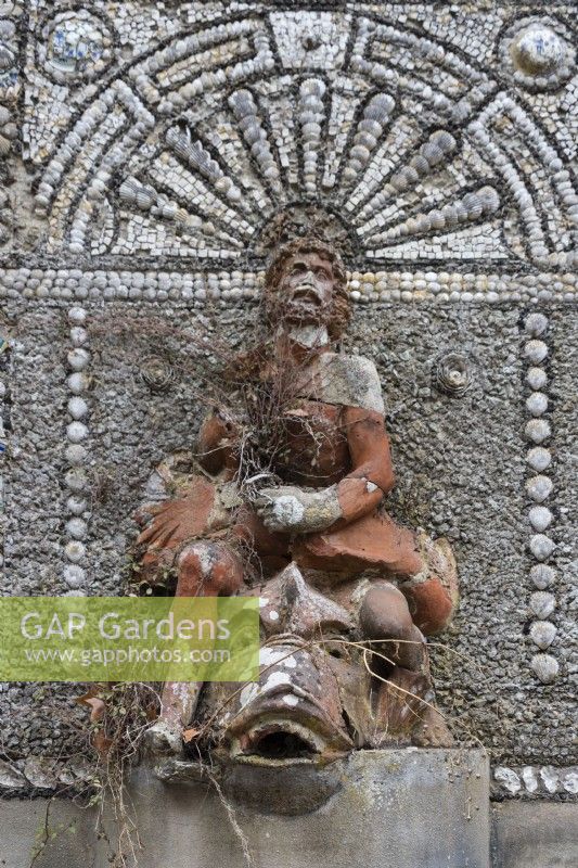 Fountain of Mermaids-Fonte das Sereias. Feature in poor condition with no water. Mosaic faced ornate walls with broken statue. Seixal, near Setubal, Portugal. September
