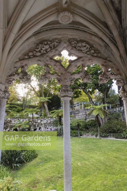 View through the Gazebo on the ornate bridge over the lower gate to the lower lawn. Sintra, near Lisbon, Portugal, September.