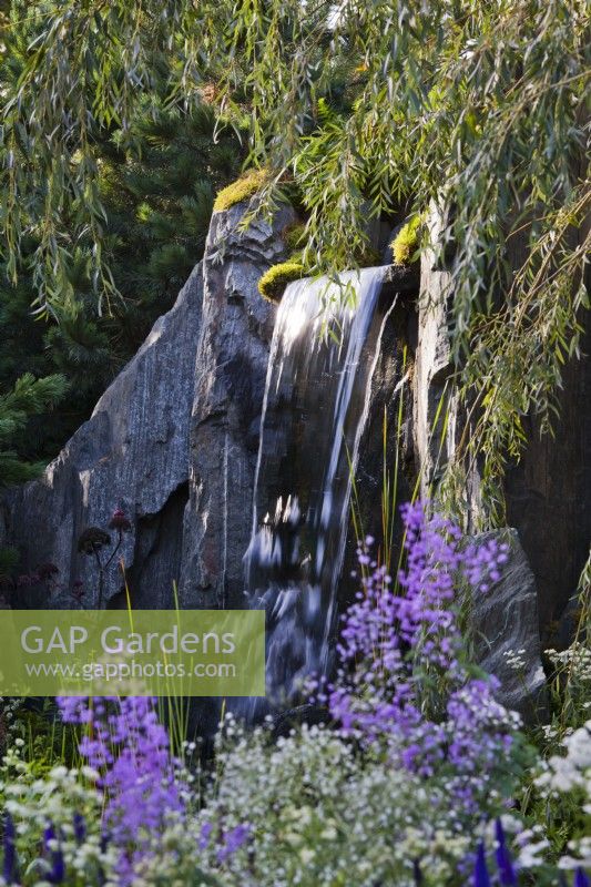 Waterfall. Bodmin Jail: 60Â° East - A Garden Between Continents, RHS Chelsea Flower Show 2021 