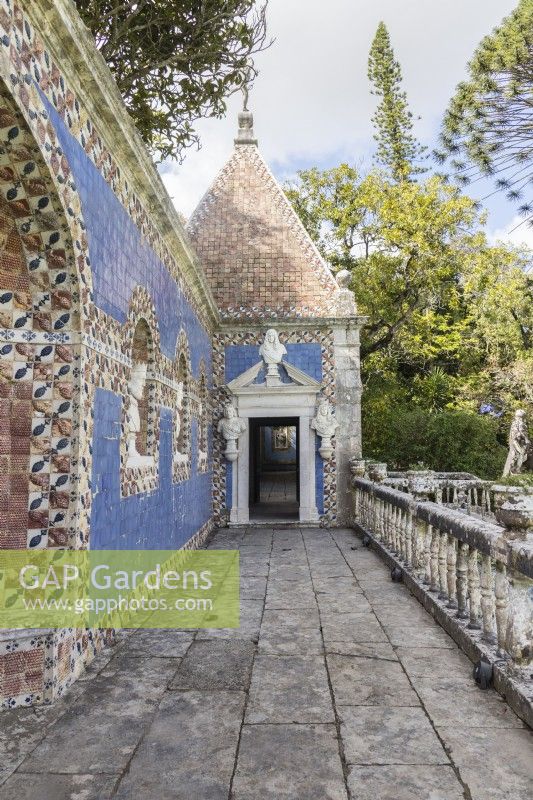 The Kings Gallery. Paved raised walkway with stone balustrade. Walls faced with glazed tiles known as Azulejos. Summerhouse within walkway.  Lisbon, Portugal, September.