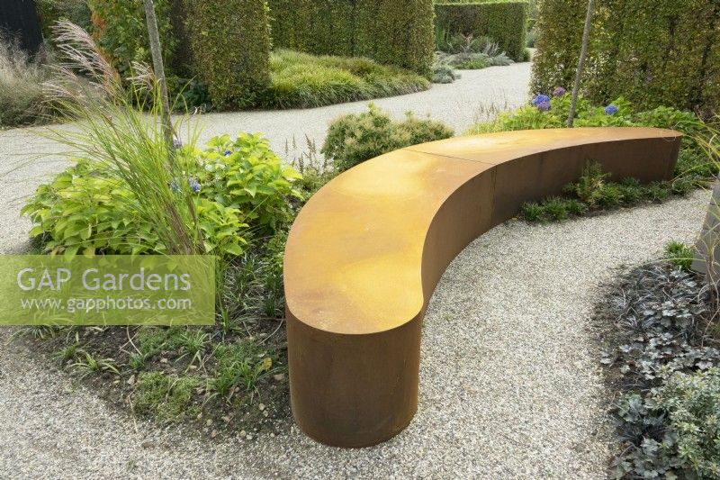 Corten steel as ornament but also as bench to use.