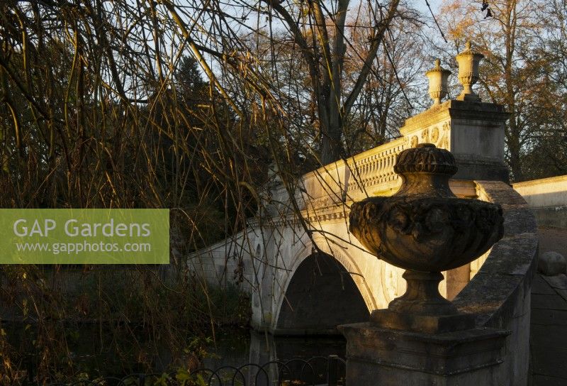 The Classic Bridge designed  James Wyat and a stone urn at Chiswick House and Garden.