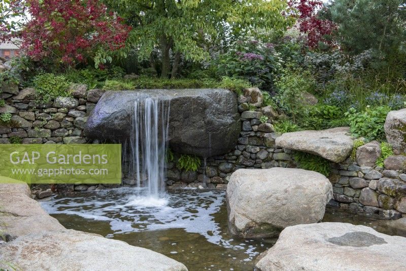 A sanctuary garden inspired by the great boulders, streams, pools and cascades of Dartmoor.