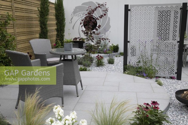 'A Very British Affair' on APL Avenue - BBC Gardener's World Live 2021 - featuring circular theme with paved seating area surrounded by drought tolerant planting in gravel garden