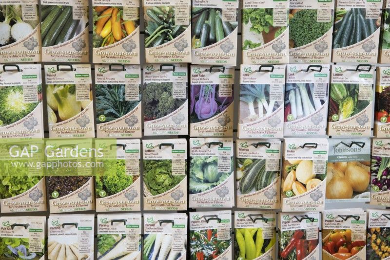 A variety of vegetable and salad seeds for sale in a garden centre. 