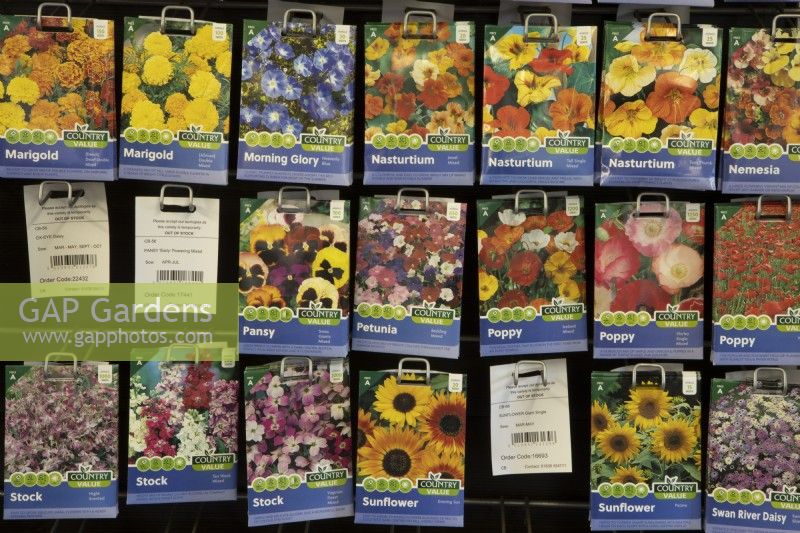 Variety of flower seeds for sale in a garden centre. 