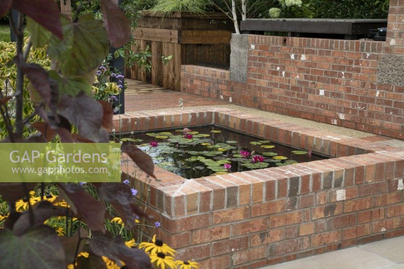 'What Lies Beneath' at BBC Gardener's World Live 2021 - brick raised pond 