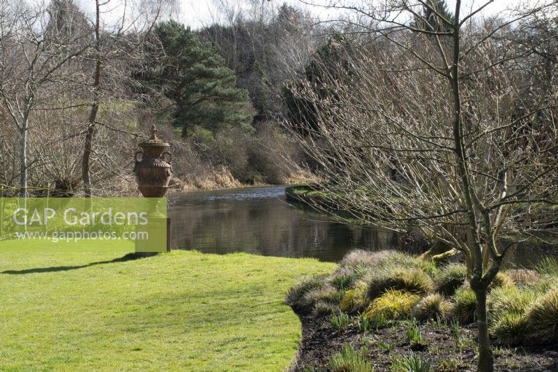 Large canal side terracotta urn in John's Garden at Ashwood Nurseries - Kingswinford - Spring