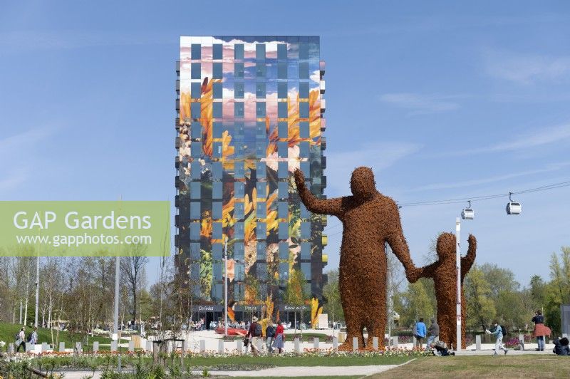 Almere The Netherlands 19th April 2022
Floriade Expo 2022. A ten-yearly botanical garden festival and exhibition, this year taking place in Almere, Flevoland. 
Statue Beehold by Arnhemse artist Florentijn Hofman, two figures holding hands and waving made up of hundreds of bees. 
