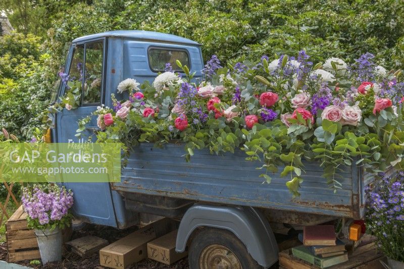 Freddie's Flowers Piaggio Ape 3-wheeled scooter cut flower stand at RHS Chelsea Flower Show 2019