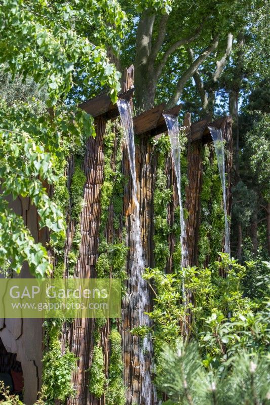 Large waterfall made from Medite Smartply, a sustainable and innovative wood-based panel product -  Building the Future, RHS Chelsea Flower Show 2022 - Gold Medal