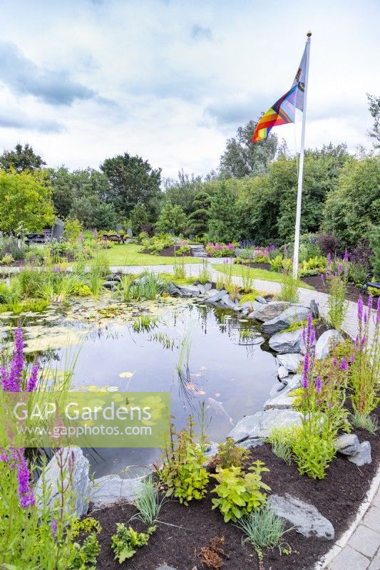Overview of garden with pond in foreground