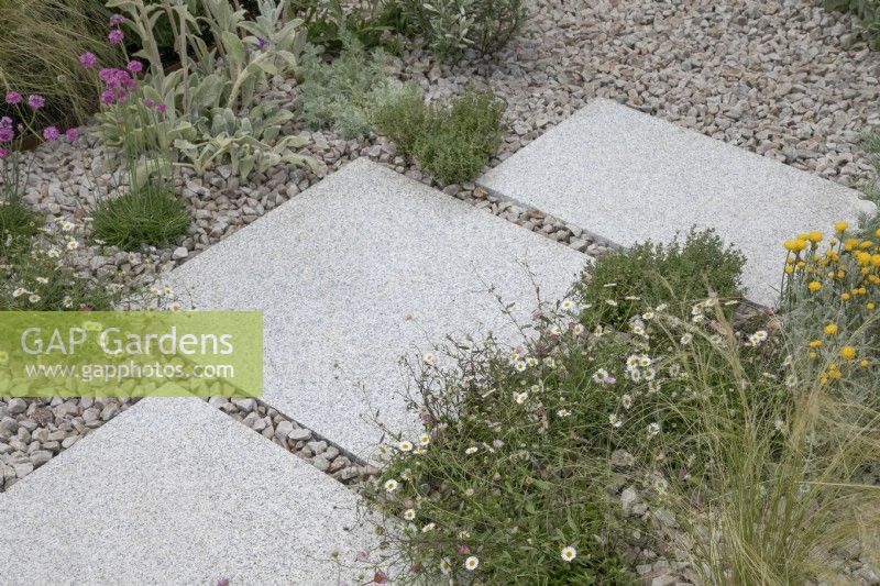 Paving stones set in gravel in Turfed Out at RHS Hampton Court Palace Garden Festival 2022