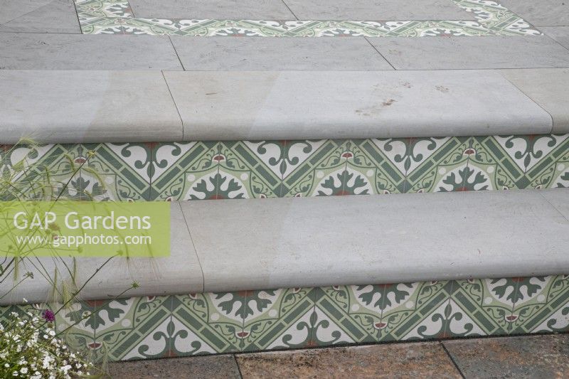 Decorative tiles as feature on the steps in the Marshalls Landscaping Garden at BBC Gardeners World Live 2022