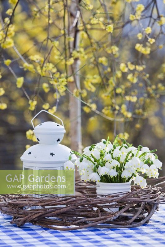 White spring flower arrangement with Snowflake bouquet.