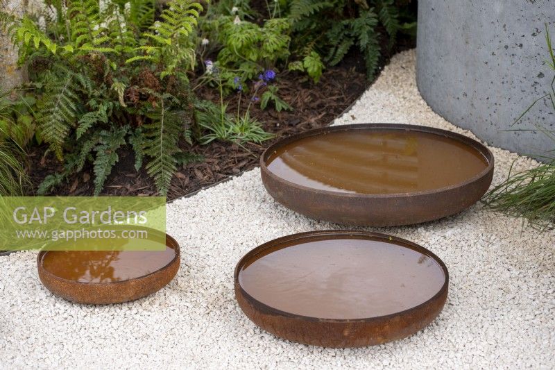 Corten steel circular water bowls - The Vitamin G Garden, RHS Malvern Spring Festival 2022