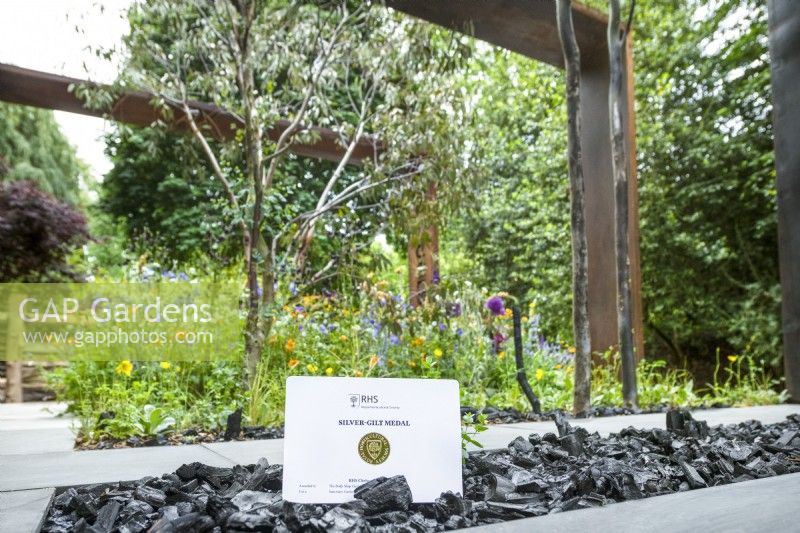 Silver gilt medal winning certificate on The Body Shop Garden stand 

Designer: Jennifer Hirsch

RHS Chelsea Flower Show 2022 Sanctuary Gardens