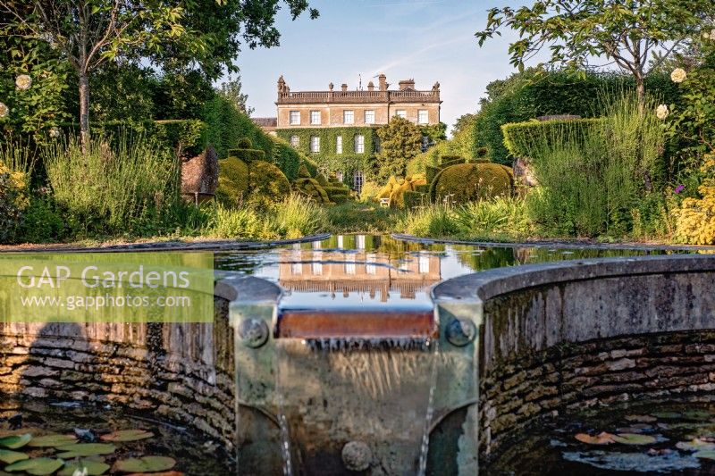 Views of Highgrove House from the Lily Pool Garden, June, 2022.