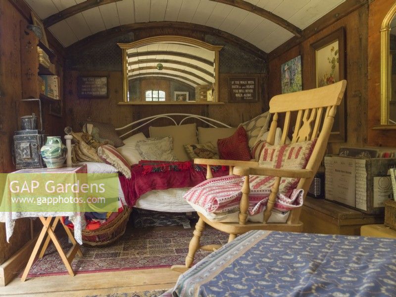 Interior of old railway carriage converted into summer house