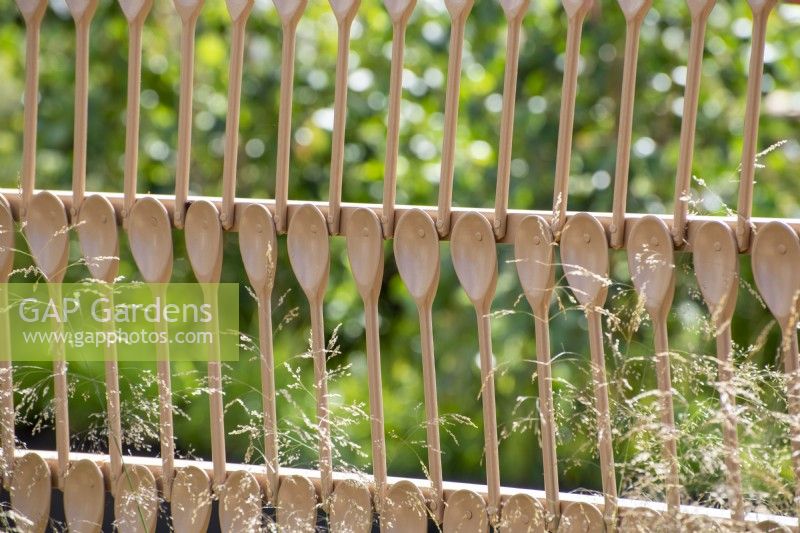 Boundary made from wooden spoons - The Wooden Spoon Garden - RHS Hampton Court Palace Garden Festival 2022