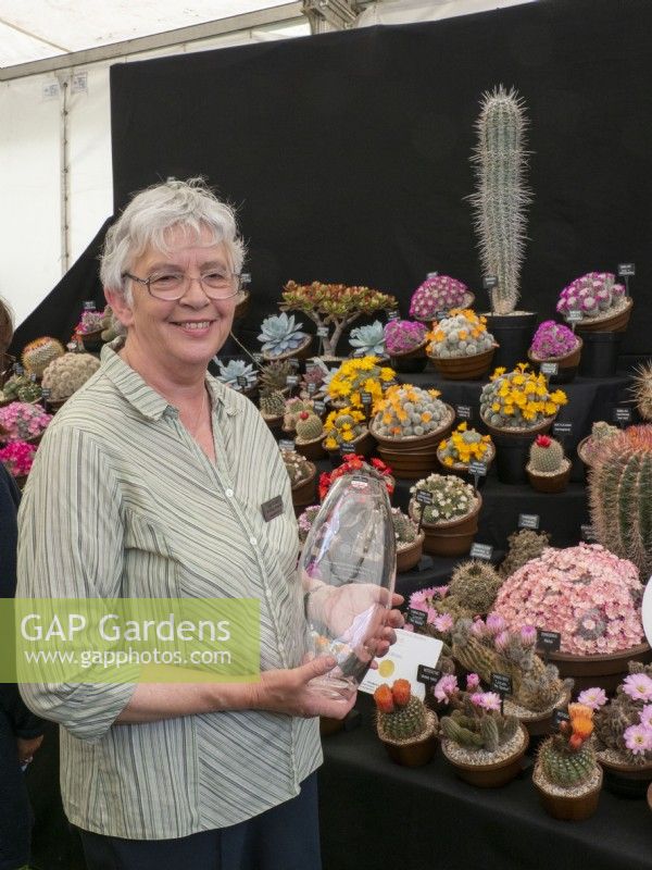 Linda Goodey with her award for best exhibit in the floral marquee at the 2022 RHS Malvern Spring Festival