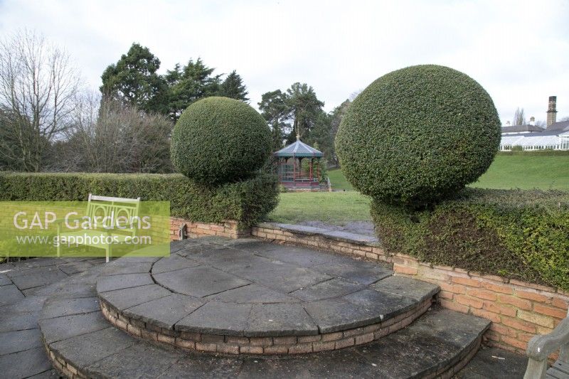 View through topiary balls to Chinese bandstand at Birmingham Botanical Gardens - January 
