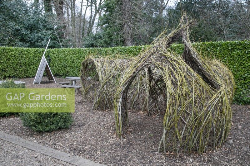 Woven willow tunnels in the play area at Winterbourne Botanic Garden - March