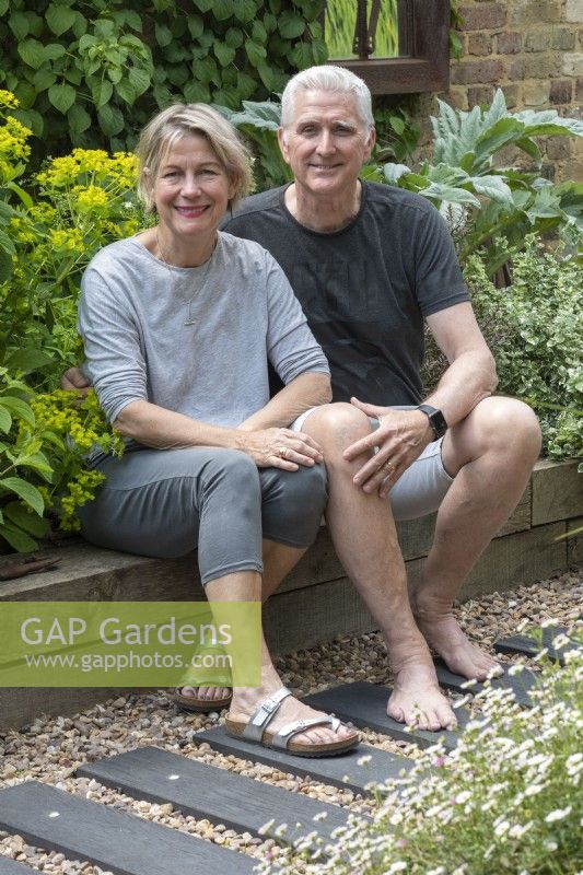 Ian and Armi Maddison in their contemporary courtyard.