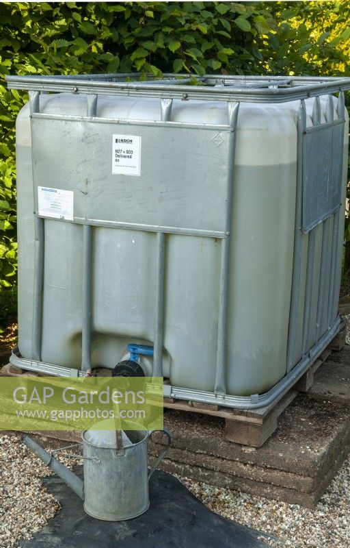Water storage in the garden in recycled industrial tank