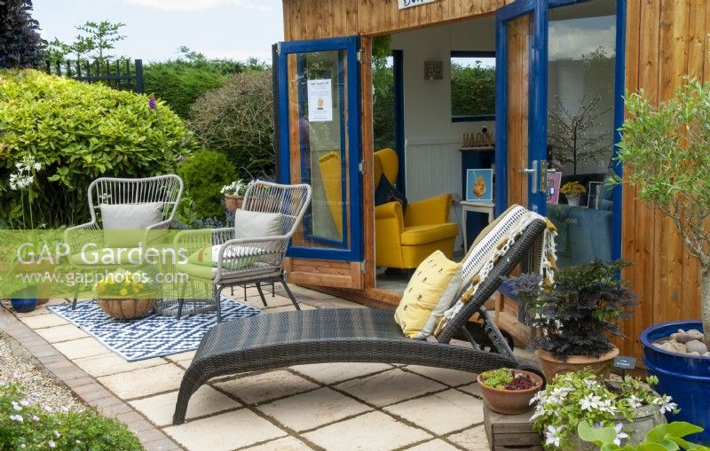 Garden studio with patio, chairs and sun lounger - Open Gardens Day, Tuddenham, Suffolk