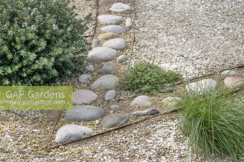Pebble mosaic detail in The HomeAway Garden at RHS Malvern Spring Festival 2023