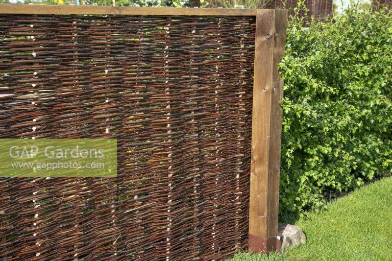Willow screen in Greener Gloucestershire NHS Garden at RHS Malvern Spring Festival 2023