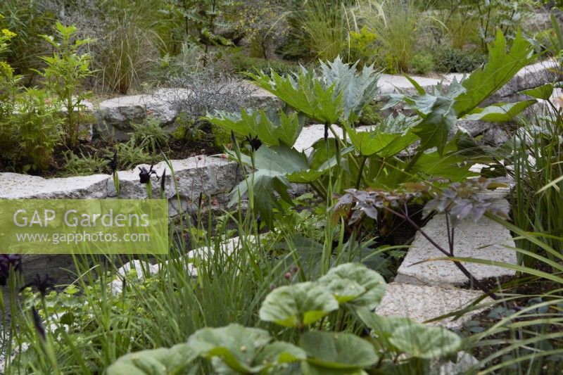 The Samaritans Listening Garden. Designer: Darren Hawkes. Chelsea Flower Show 2023. A garden of salvaged materials. Summer. May.