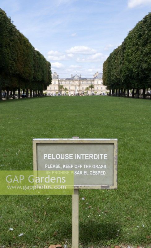 Paris France
Jardin du Luxembourg 
Sign 'Pelouse interdit, please keep off the grass.' 