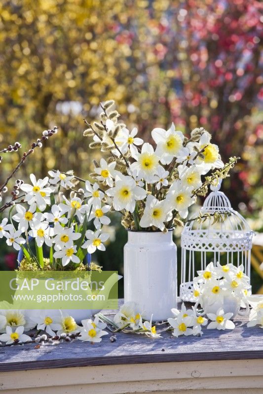 White themed arrangement with daffodils and pussy willow.